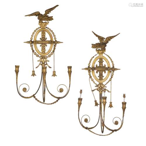 PAIR OF NEOCLASSICAL GILTWOOD WALL SCONCES19TH CENTURY each openwork oval backplate enclosed by a