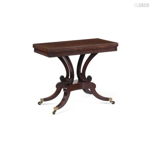 REGENCY STYLE MAHOGANY TEA TABLE19TH CENTURY the rectangular fold-over top with a bead moulded edge,