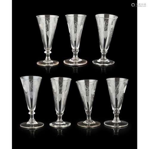 SEVEN GEORGIAN ETCHED ALE GLASSES18TH CENTURY with flared bowls engraved with barley and hops,