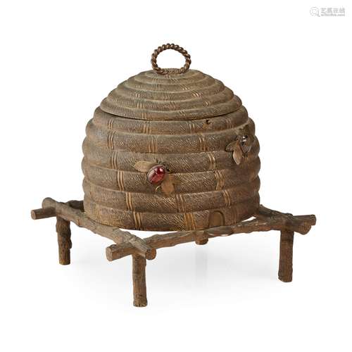 ENGLISH GILT BRASS BEEHIVE SEWING BOX19TH CENTURY in the form of a bee skep, with a hinged lid and