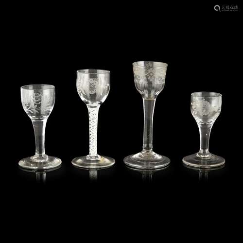 GROUP OF FOUR GEORGIAN ENGRAVED WINE GLASSESMID-18TH CENTURY comprising a double-series opaque