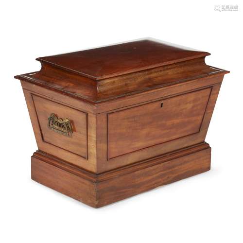 LATE GEORGE III MAHOGANY CELLARETTEEARLY 19TH CENTURY of sarcophagus form, opening to reveal a