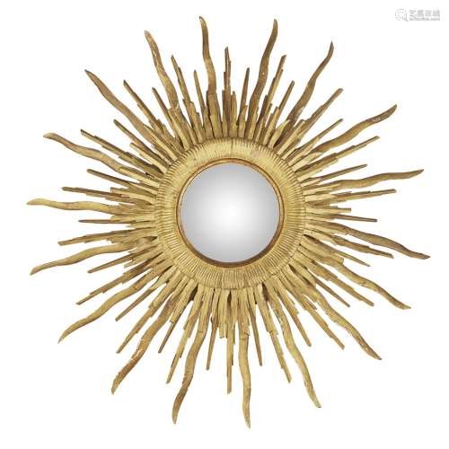 CONTINENTAL GILTWOOD SUNBURST MIRROR19TH CENTURY the convex mirror plate enclosed by a moulded