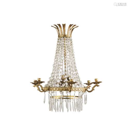 GILT METAL AND CUT GLASS CHANDELIEREARLY 20TH CENTURY the gilt metal feather corona above cut