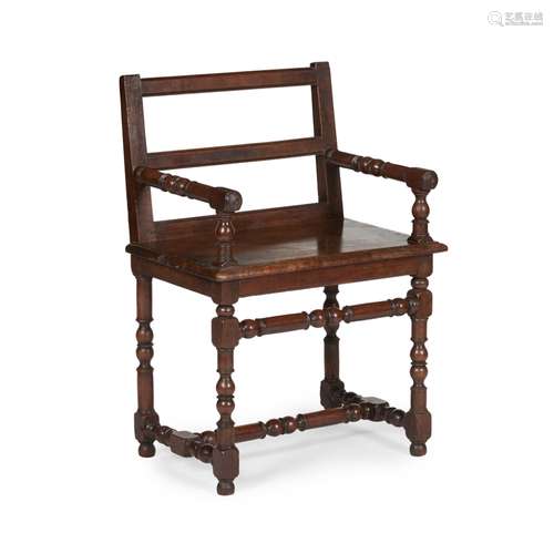 ITALIAN WALNUT ARMCHAIR18TH CENTURY the wide double slat back and ring turned arms above a plank