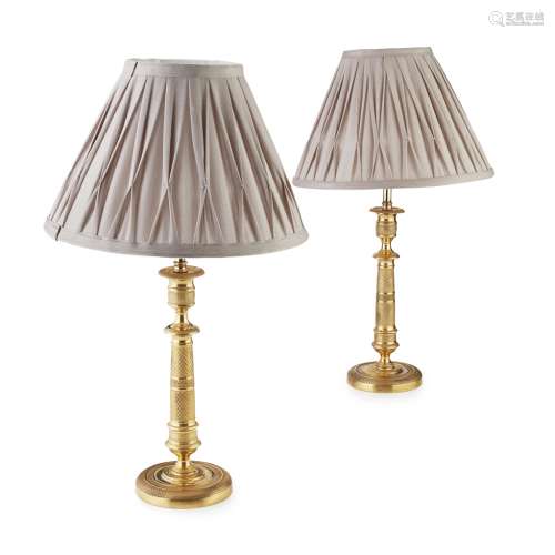 PAIR OF REGENCY GILT BRONZE TABLE LAMPSEARLY 19TH CENTURY previously candlesticks, with baluster-