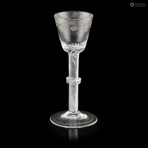 GEORGIAN ENGRAVED TWIST STEM WINE GLASSCIRCA 1750 with a round funnelled bowl engraved with fruiting