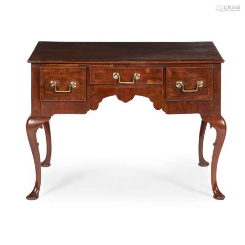 GEORGE I/II WALNUT LOWBOY18TH CENTURY the crossbanded moulded rectangular top above a shallow