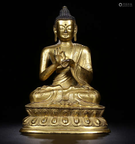 A GILT BRONZE SAKYAMUNI BUDDHA