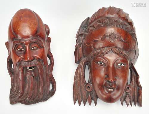 Two Oriental Carved Wood Masks, 20th C