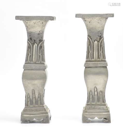 A Pair Of Pewter Candlestick