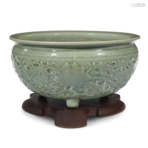 A large Chinese celadon-glazed carved porcelain censer
