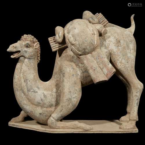 A Chinese grey pottery model of a kneeling Bactrian camel
