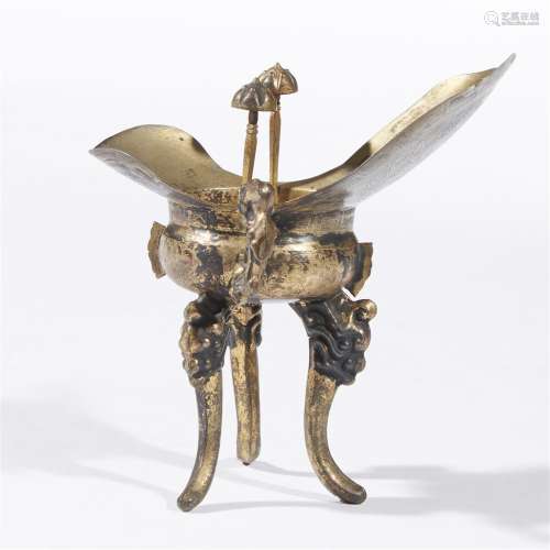 A Chinese silver-gilt tripod libation cup, jue