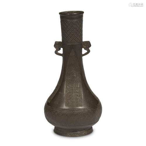 A Chinese patinated bronze vase with cloud handles