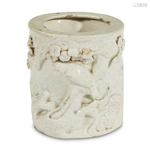 A white-glazed molded, incised and applied porcelain  