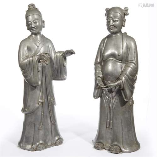 A pair of finely cast and engraved Chinese pewter figures