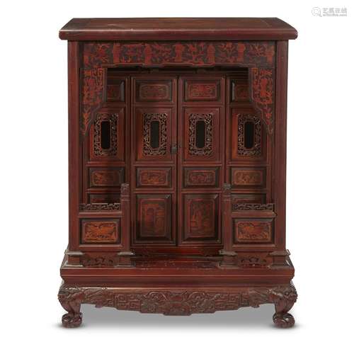 A Chinese inlaid, carved and stained softwood altar cabinet