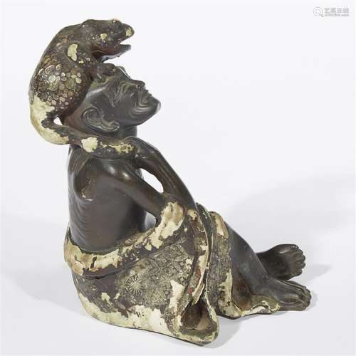 An unusual mother of pearl-embellished lacquered bronze figure of Liu Hai and toad