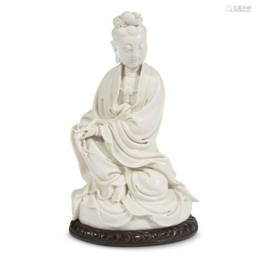 A Chinese Dehua porcelain figure of Guanyin seated