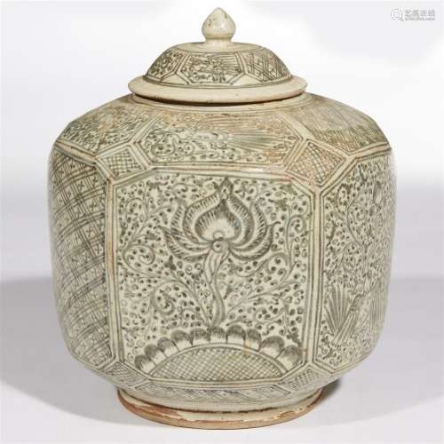 A large Thai underglaze blue-decorated stoneware faceted jar and cover.