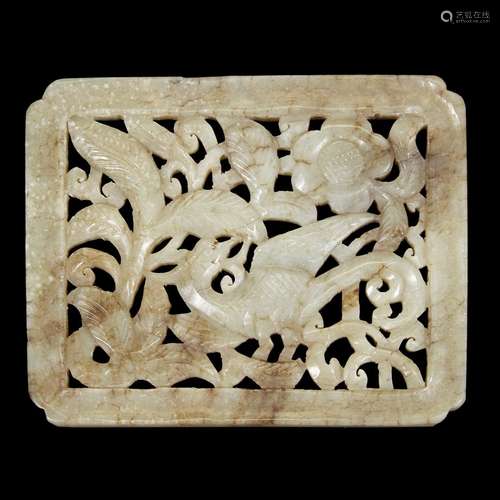 A Chinese carved and pierced grey and beige jade plaque