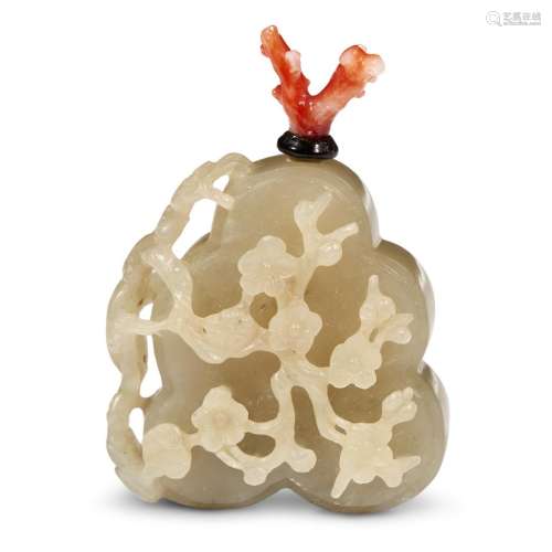 A Chinese carved celadon jade reticulated 