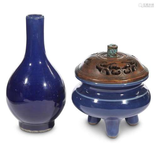 A small Chinese cobalt blue-glazed tripod censer and a small bottle vase