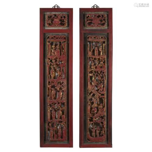 A pair of Chinese parcel-gilt and lacquered carved and pierced wood panels