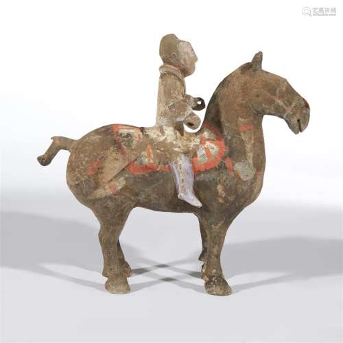 A Chinese painted grey pottery horse and rider, Shaanxi province