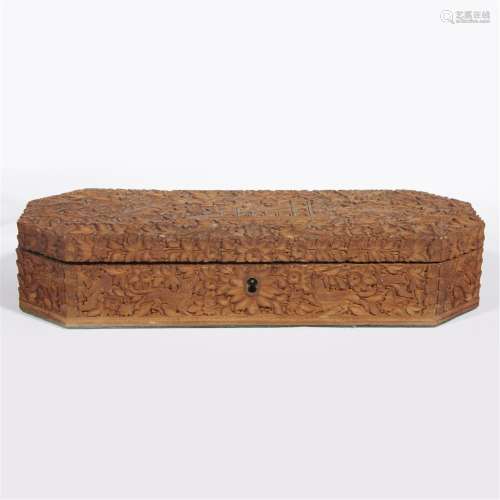 An Indian carved sandalwood box with key