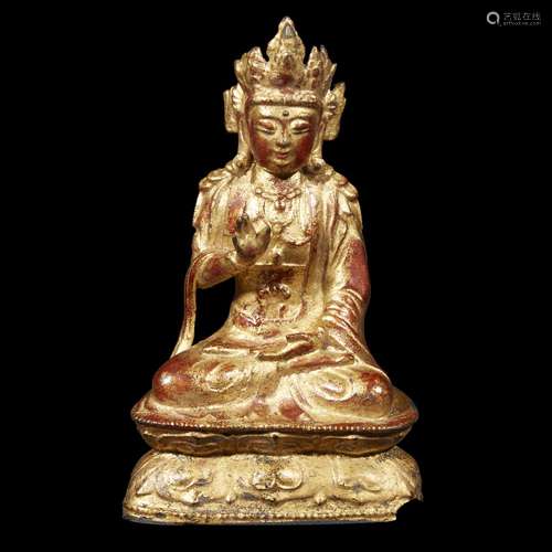 A Chinese lacquered bronze figure of seated Guanyin