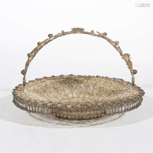 A Southeast Asian or Chinese silver swing-handle filigree basket