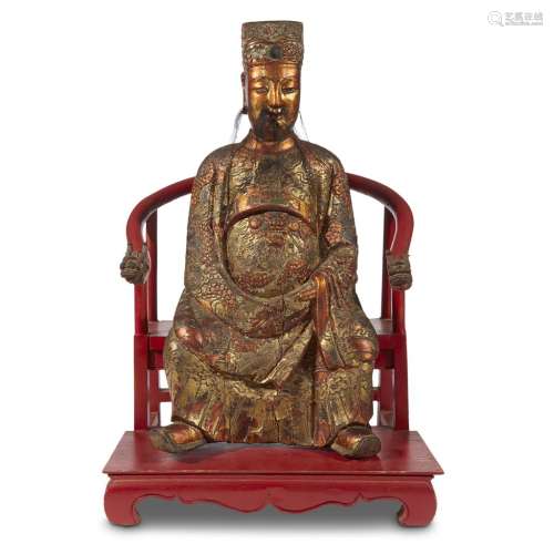 A Chinese gilt lacquered wood figure of a dignitary on later horseshoe-back seat