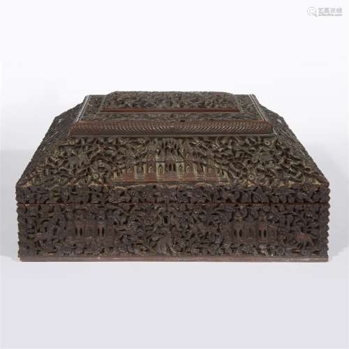 An elaborately carved Indian sandalwood toiletry case