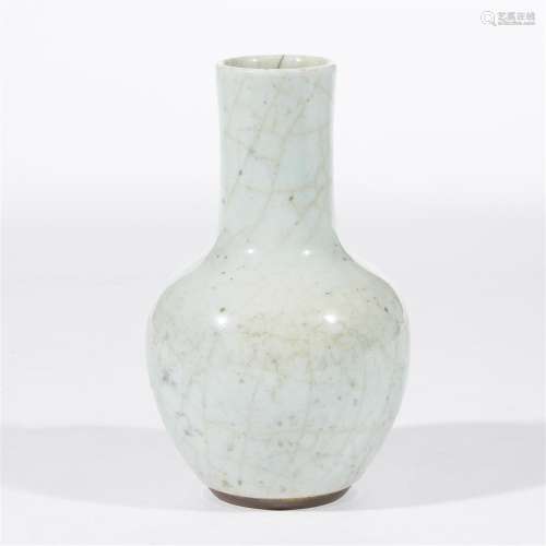 A Chinese pale celadon-glazed bottle vase
