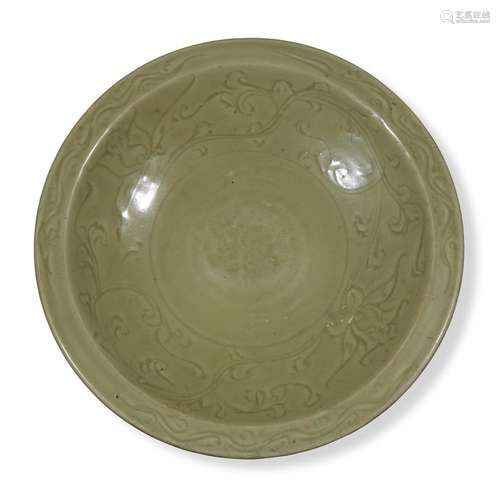 A Chinese Lonquan molded and incised celadon circular large dish