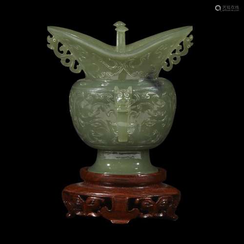 A Chinese finely carved celadon jade small libation vase
