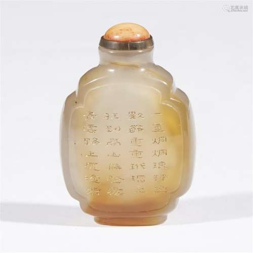 A Chinese inscribed agate snuff bottle
