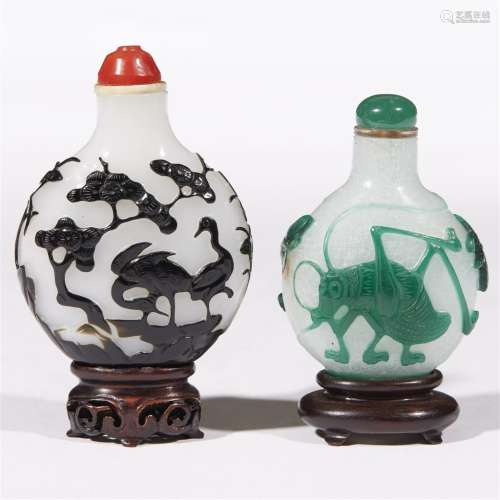 Two Chinese cameo glass snuff bottles.