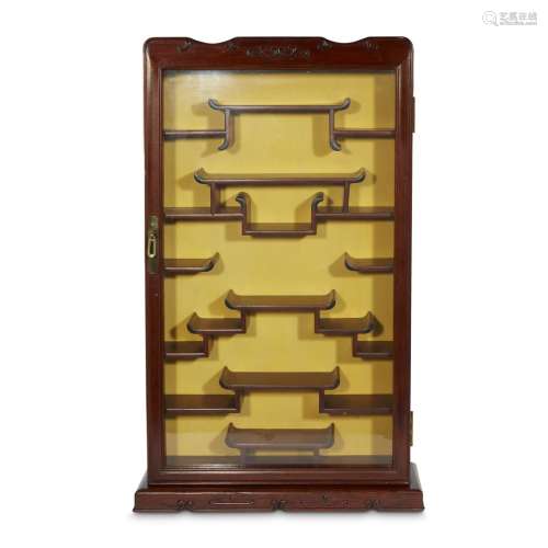 A Chinese hardwood hanging display cabinet