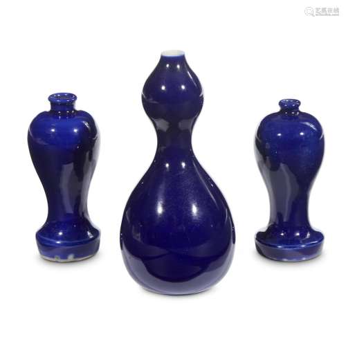 A group of three small Chinese cobalt blue-glazed vases