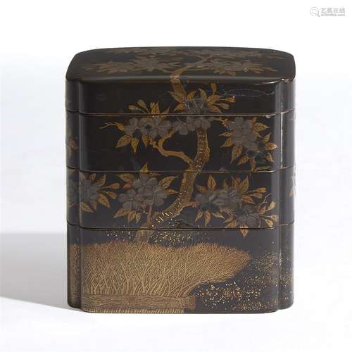 A small Japanese lacquer three-tiered box and cover