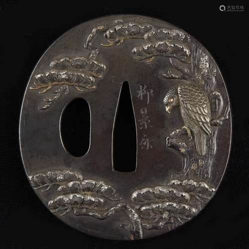 A Japanese finely-executed mixed-metal inlaid iron tsuba