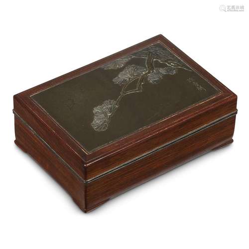 A Japanese patinated metal and hardwood rectangular covered box