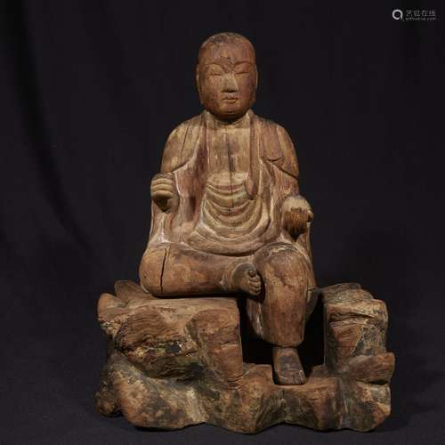 A Japanese carved wood figure of seated Jizo Bosatsu