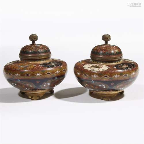 A pair of Japanese cloisonne tripod censers and covers