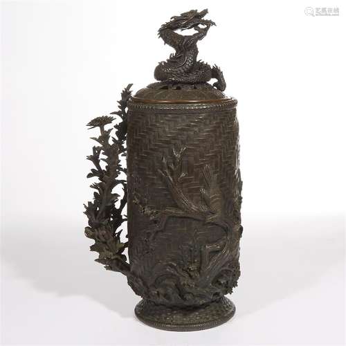 A Japanese patinated bronze 