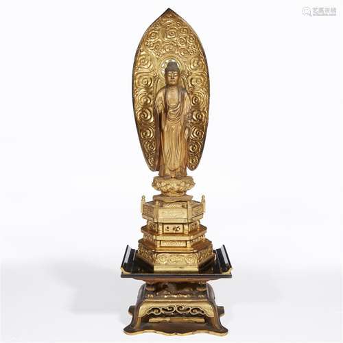 A Japanese giltwood Amida Buddha with associated stand