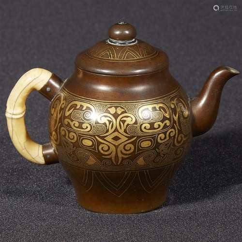 *A small finely-decorated Japanese gold-inlaid patinated metal teapot